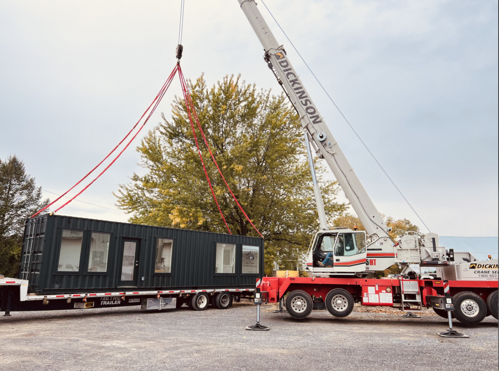 GeoPro's Voyager home crane set onto truck for shipment.